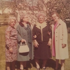 My mom, with Grandma Puleo, and Aunt Angeline, who always pinched my cheek really hard and someone I don't recognize. In the back yard on Burton Ave.