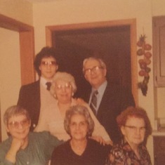 Not sure where this is,  but by those glasses I am wearing its in 1979 or around there. 
L-R, Carmella Corrella, me, Faustina, Carrie Lee Minadeo, my dad, Bessie Mitchell.