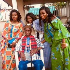 grandpa with lovely grand daughters (Onyechere's family)