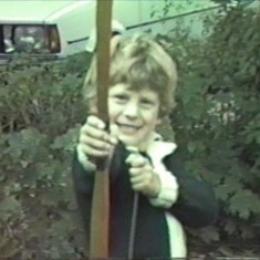 Little Filip with bow and arrow