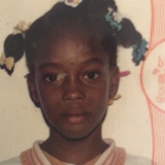 Her first passport. 1991