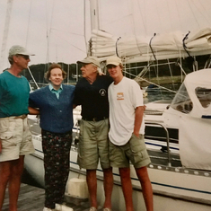 Forbes, our mother, father and nephew Rob by Forbes's sailboat Stonefire in Manchester, MA harbor 1997.