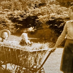 Our mother taking us for a hay ride, visiting our grandparents 1946.