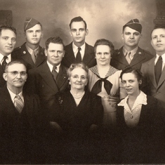 The Couchman Family: taken October 20, 1942 (Left to right)

Front: Father David E., Mother Hattie, and Kathryn (Spud)
Middle: Theodore (Ted) and Alta
Back: Dave, Robert, Donald, Forrest and Harold (Red