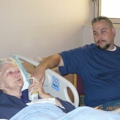 Mom & Gary holding hands in the VA Hospital in Nashville, TN