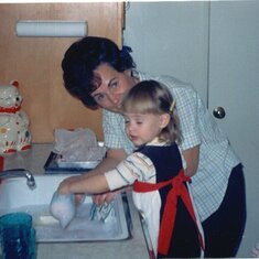 Mom and me doing dishes
