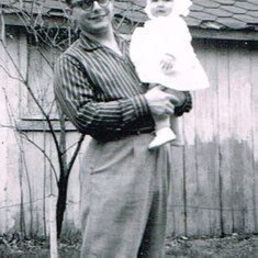 Fran holding Beth, 1962