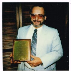 Fran receiving Teaching Excellence Award, UT, 1989