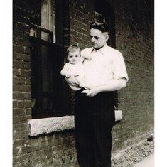 Fran held by his father, 1938