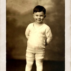 Dad in a 1930's vintage childrens "British style romper" - no doubt knitted by one of his relatives