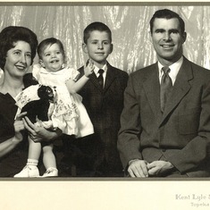 Bishop Family Portrait: Mom holding Reta Jane, Stewart and Dad