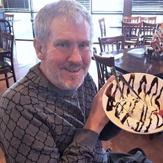 I took this on your 57th birthday at the Tilted Kilt in Victorville. You loved desserts! 