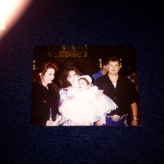 I still miss you Freddie Here is a picture of me and you and maria and Laura when you baptized her 