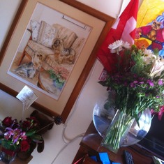 Pictures and flowers in her room