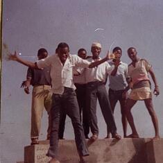 FGC Odogbolu days: Kayode Yusuf jumping, Funsho aka Yoga @ far left, Fresh @ far right.