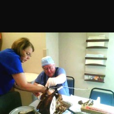 This is a pic of Dr Hoyos with his WHT family,  Thanksgiving 2010. I posted on FB with the caption, "Pawpaw carving the turkey."  When someone told him to be careful with the electric knife, he said, " I'm a surgeon, trust me."