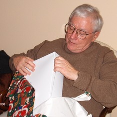 Happy opening his gifts