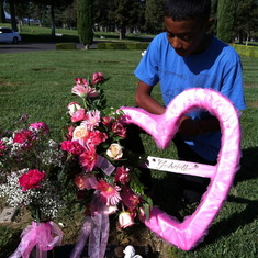 Treyson loves you so much. He helps keep your marker clean and flowers fresh.