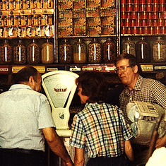 Gail giving advice in a Cairo spice shop with Nutrition CRSP colleagues, mid-1980s.