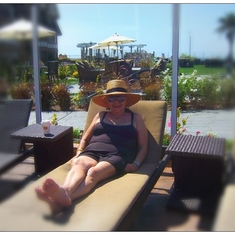 44 - Gail soaking in the California sun in La Jolla, CA Fall 2011.  She loved this wide brim cap ... I do too