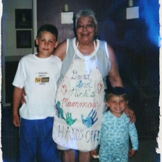 18 - Mammaw with her grandsons David and Nic showing off her new apron they made for her! She kept that apron and it went back to her daughter Jen when she passed - wow did she love it!