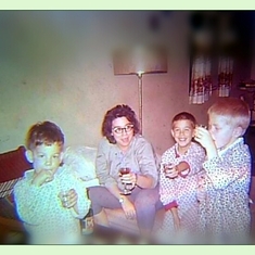 32 - What are ya doin' New Year's Eve? A midnight toast with her first three sons, Rick, Frank,and Marty circa 1960s