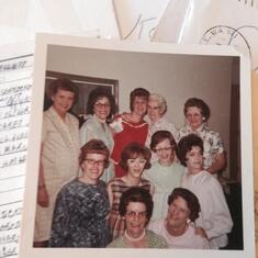 The ladies in my Mom's family.  Mom is in the light blue dress in the middle.