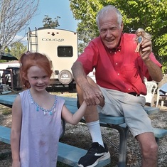 Garrett with his adopted granddaughter Zella. 