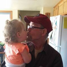 He enjoyed being a grandpa. Here he is with his youngest granddaughter Amberlynn