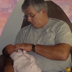 Dad holding Maddie ❤️