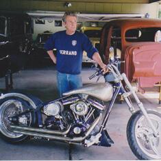 Butch working on a Harley Davidson, If it had wheels and could go fast he loved it...