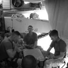 Lee is on the right side of this photo - playing cards with the guys
