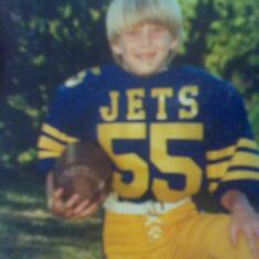 Loved football from even a "pee wee" age. gave it all he could. He was my big, little football champ!!