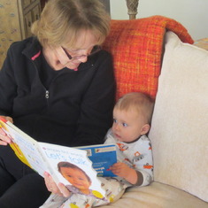 Reading to baby Daniel (2013)