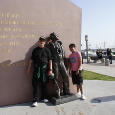 One of Gene's crazyness=) if you can zoom it he was pointing to his name in a memorial wall in sandiego