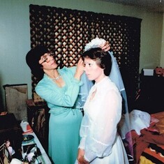 Mom helping me on my wedding day, Sept 2, 1978