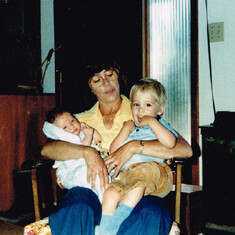 Gen Marsh holding grandkids Ben David baby and Darrell Jr. Marsh