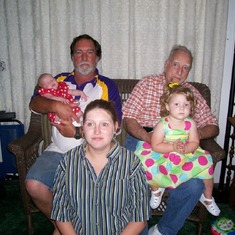 Kelvin holding Tori, George with Kayla on his lap & Jenny