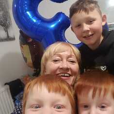 Linda with our three great grandsons.You knew Jake as a baby and he's 10 now.   