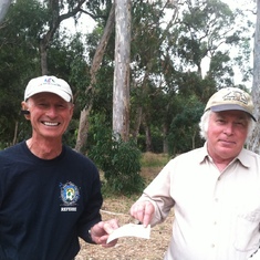 George giving a SMCCA check to Randy Young for the work at the grove (believe so) 9.12.12 