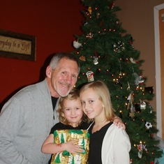 Christmas Eve, 2009, with granddaughters, Madison and McKinzie.