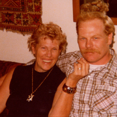 With his mother, Margaret.
