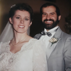 November 1986.  Mr & Mrs. C.  He skipped down the altar steps after our vows!