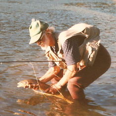 Gerry releasing a fish, 2000