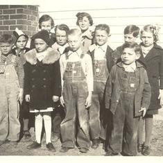 Gerry as boy in third grade, first boy in front row on the left