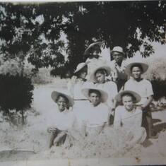 At La Plaine - Top row (l-r): Maman Vava, Marcel Cauvin; Middle row: Resia Cauvin, Lucie Cauvin, Paulette Cauvin; Bottom row:  Jeanne Cauvin, Lina Cauvin, Germaine Cauvin
