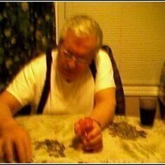 Dad counting his winning playing cards