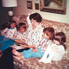 Gertie reading to grandchildren