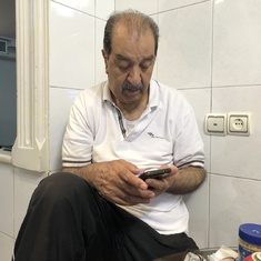 Dad Ghassem and his smart phone