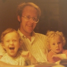 With daughters, 1975